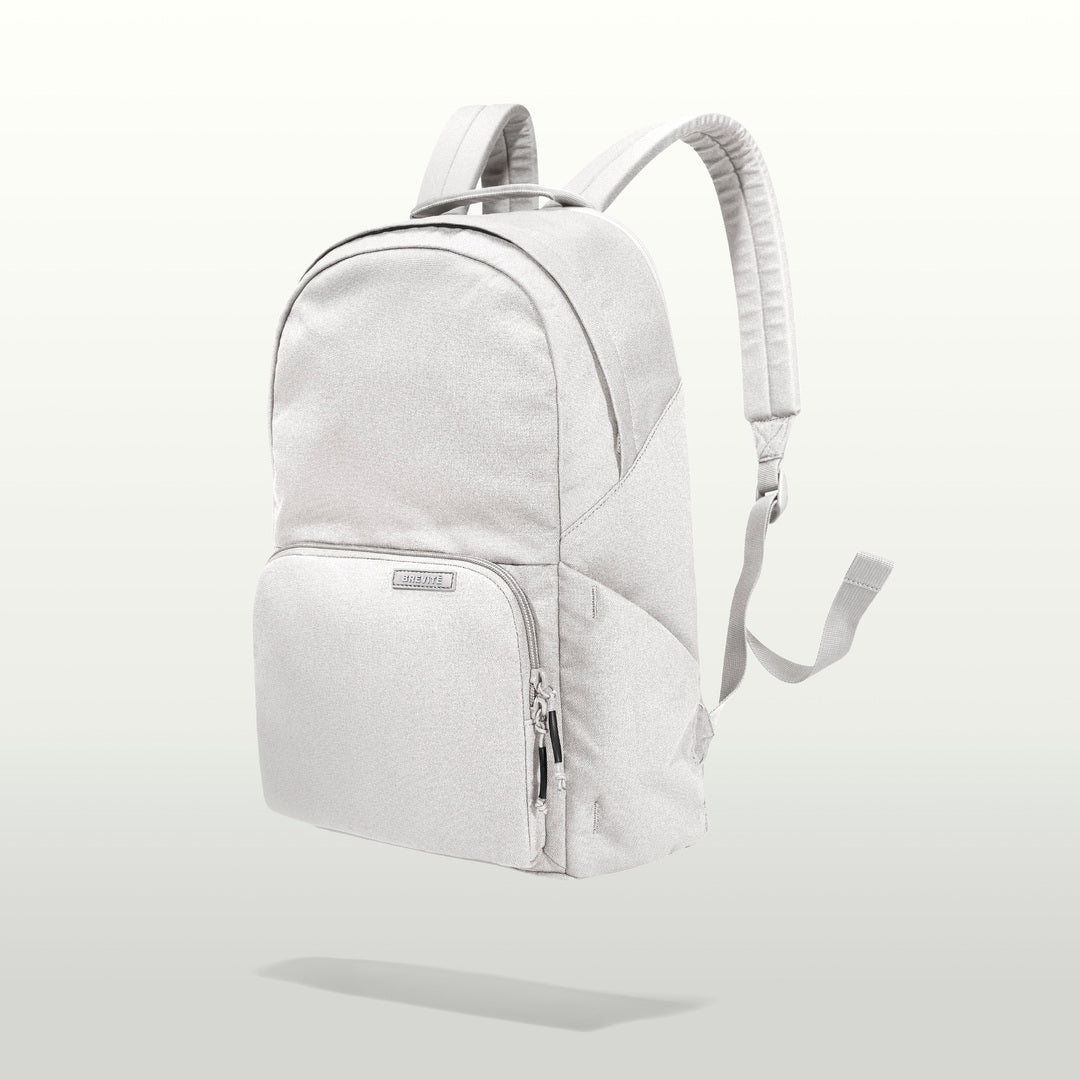The Brevitē Backpack in Nimbus Gray, three-quarter view