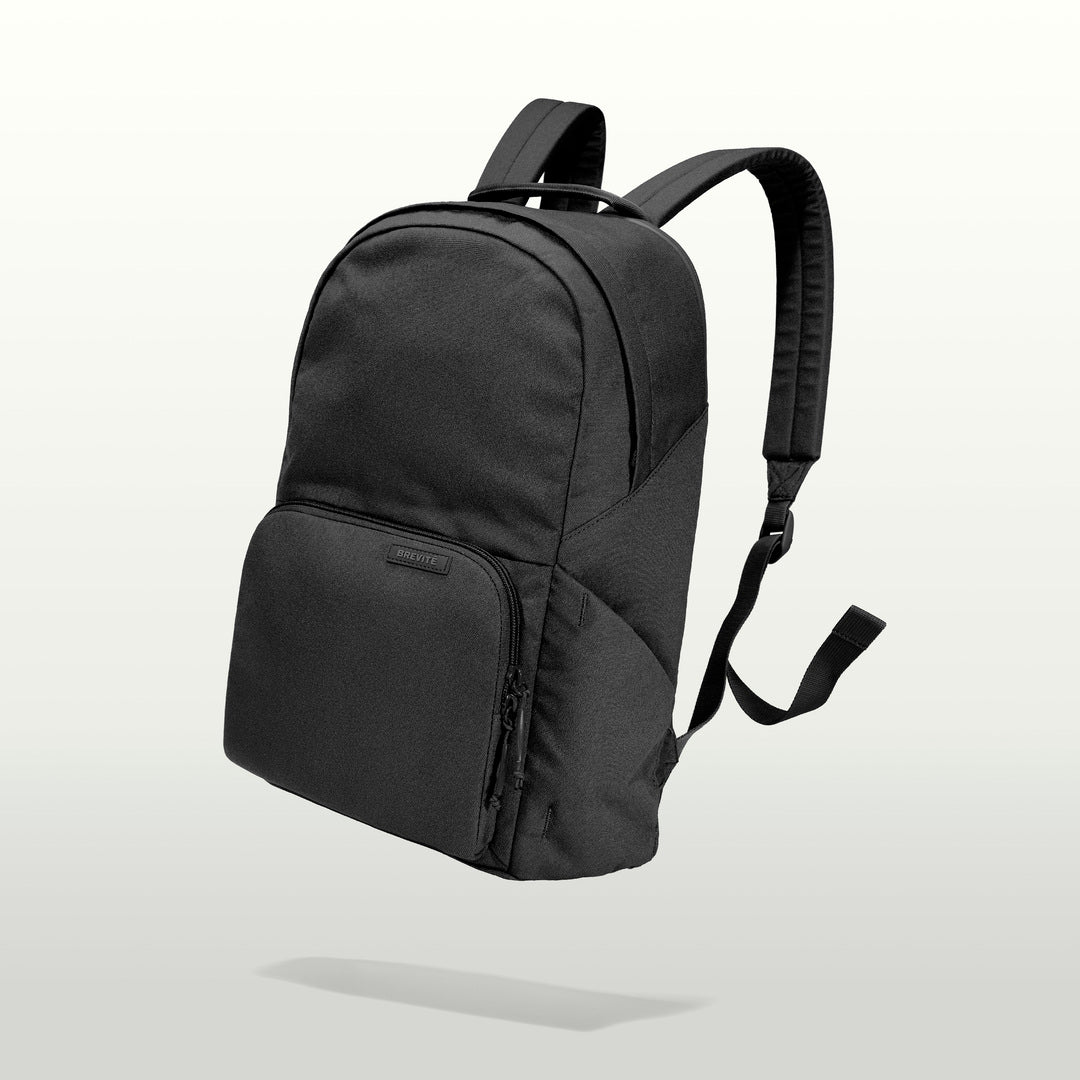 The Brevitē Backpack in Triple Black, three-quarter view
