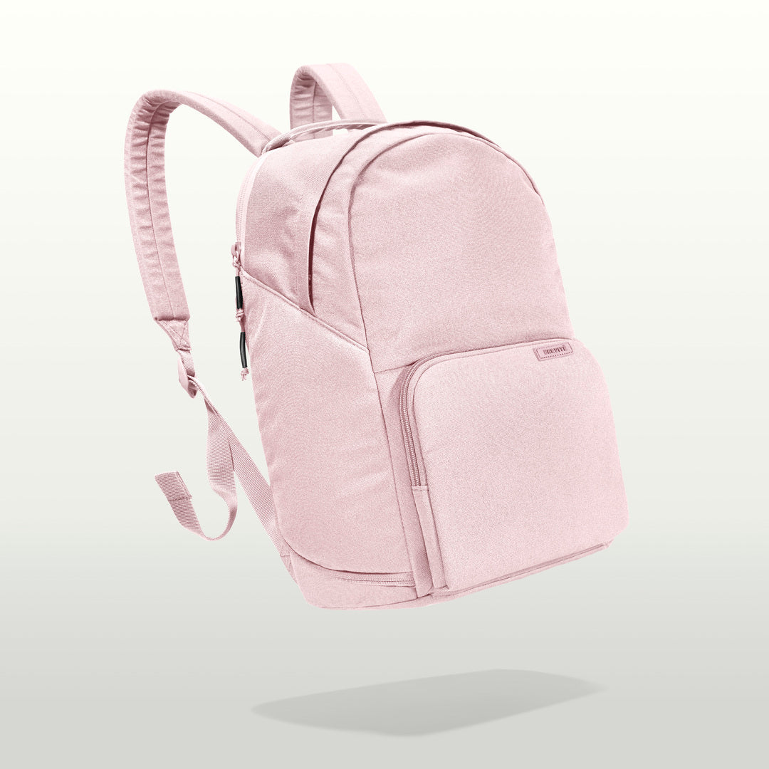 The Brevitē Backpack in Blush Pink, three-quarter view