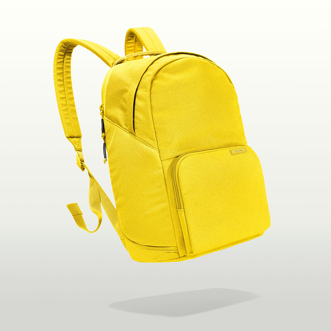 The Brevitē Backpack in Lemon Yellow, three-quarter view