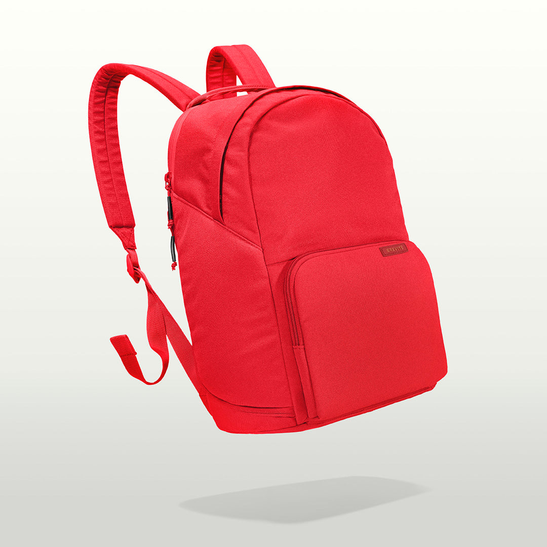 The Brevitē Backpack in Poppy Red, three-quarter view