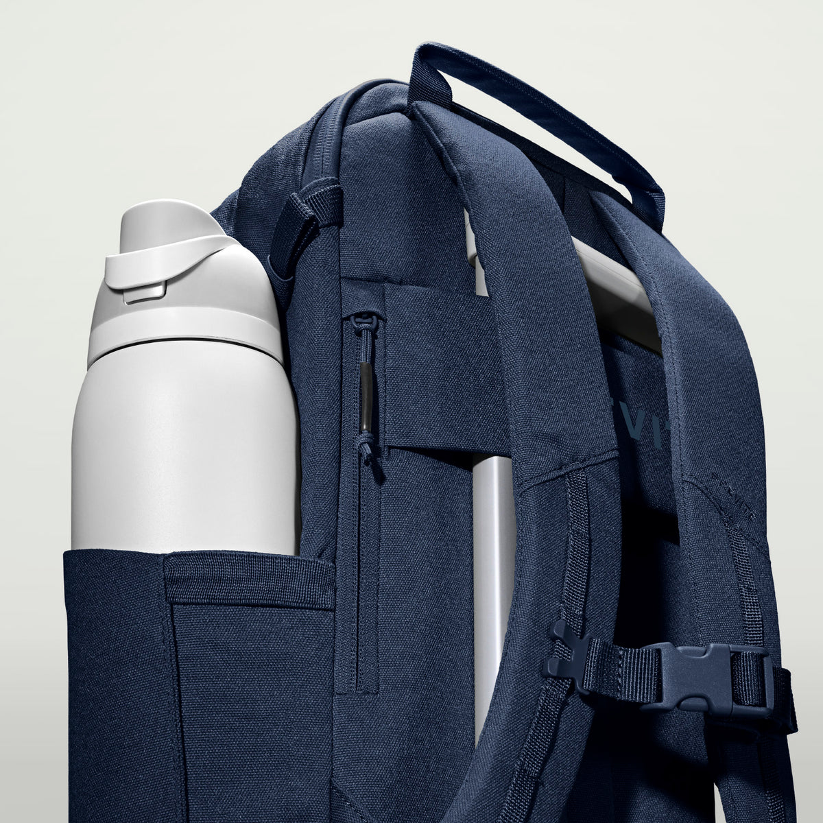 The Jumper in Moonlit Blue, side bottle pocket