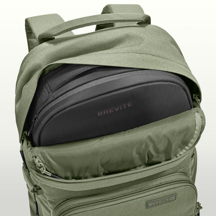 Camera Top Insert zipped into the top of an open Pine Green Jumper