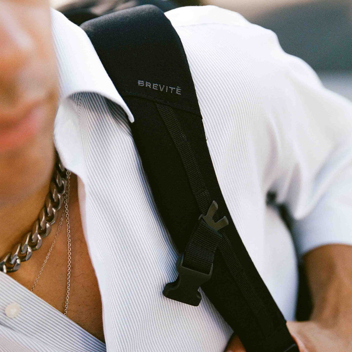 The Jumper Large in Triple Black, shoulder strap and sternum strap, worn